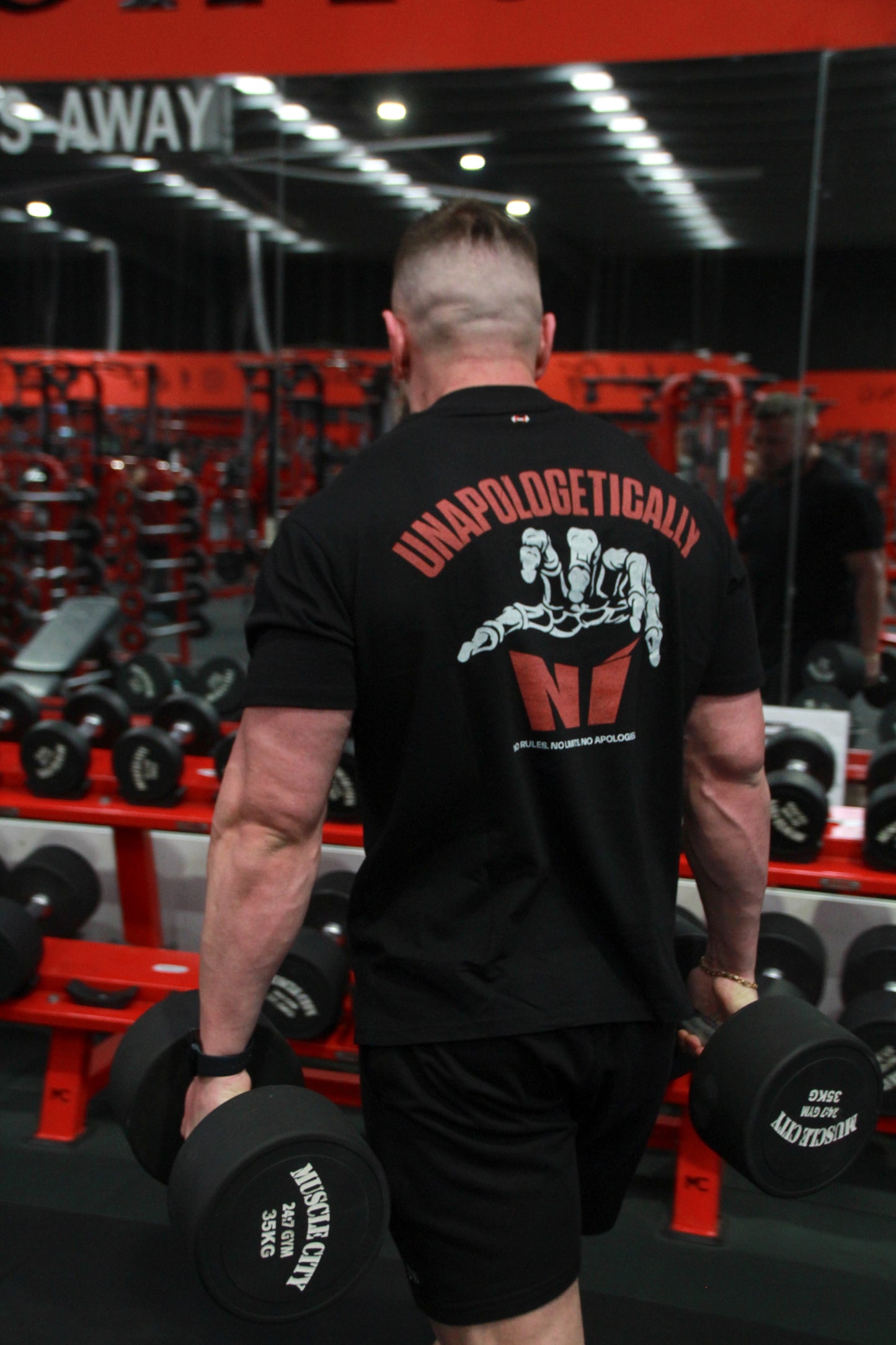 Unapologetic Grip - Oversized Unisex Tee with the skeletal hand graphic
