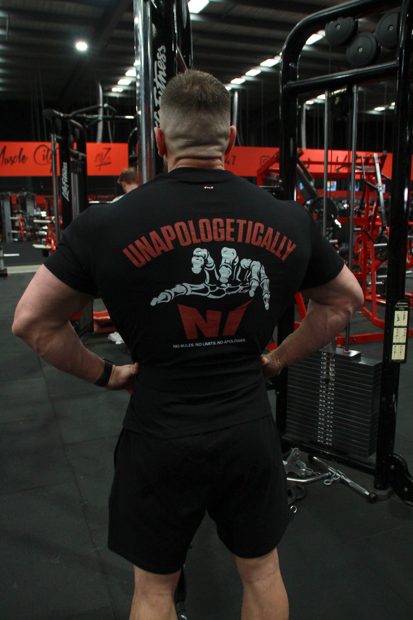 Unapologetic Grip - Oversized Unisex Tee with the skeletal hand graphic
