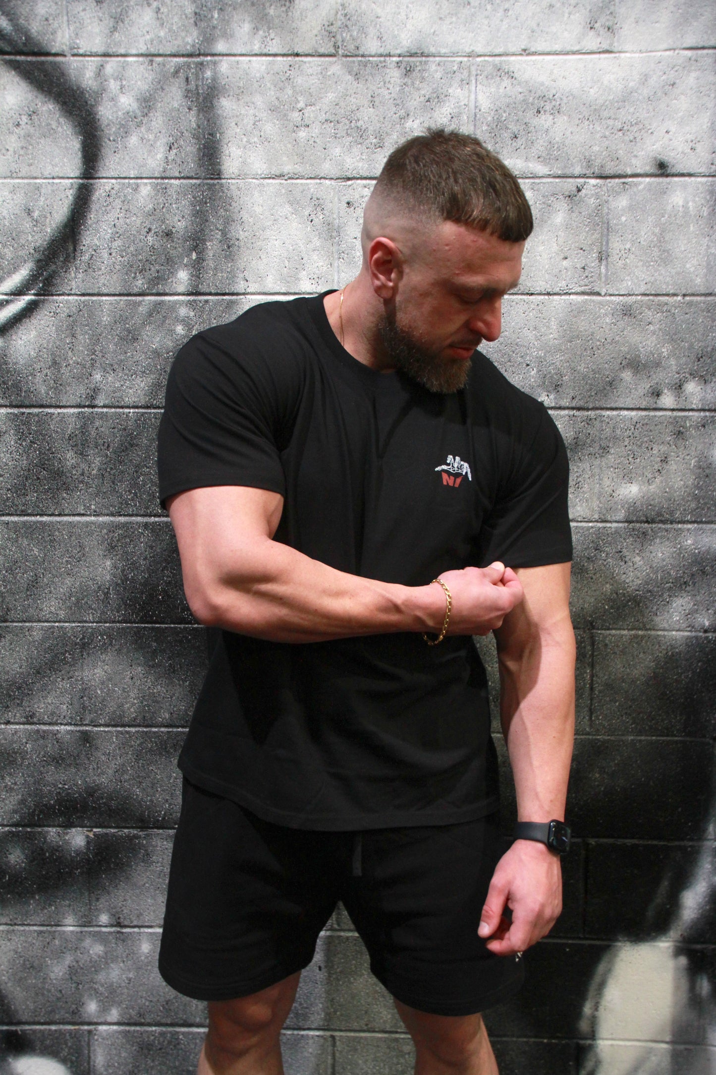 Unapologetic Grip - Oversized Unisex Tee with the skeletal hand graphic