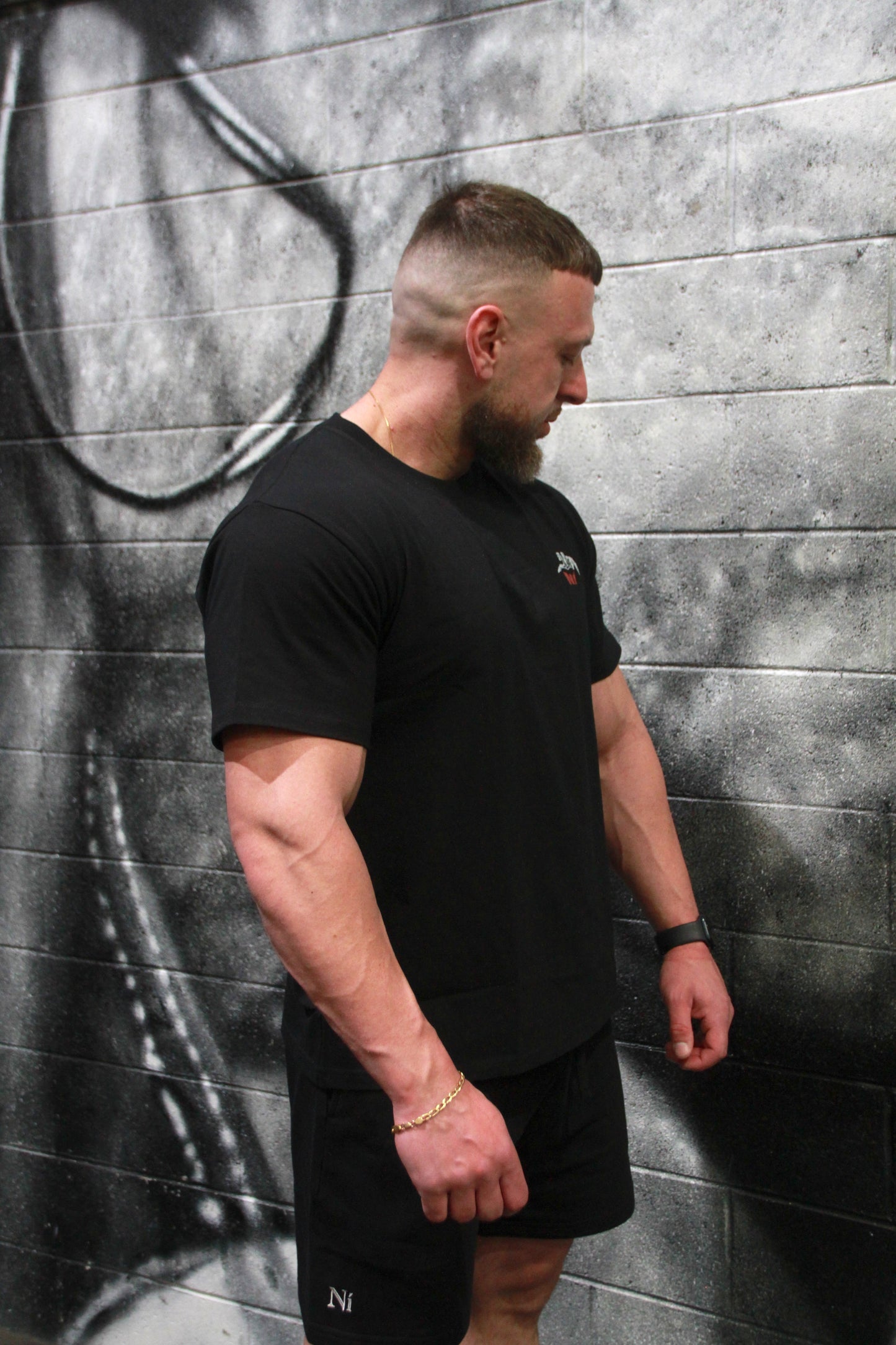 Unapologetic Grip - Oversized Unisex Tee with the skeletal hand graphic
